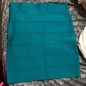 Turquoise Bebe bandage skirt size M